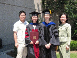 Yao Tan, Xingdong Zhu, Liz Butler, and Yiran Dong at Convocation (May 2007). Photo by Lixia Chen.
